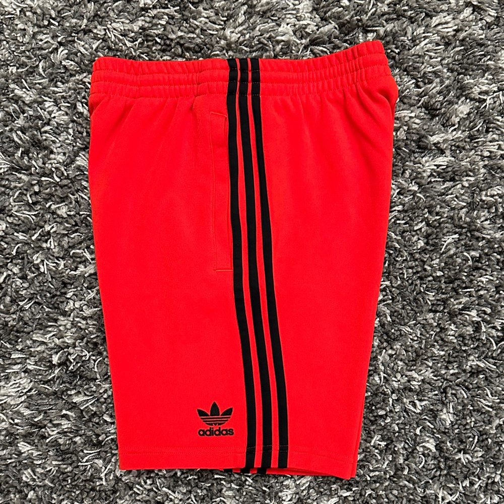 Adidas Men's Athletic Orange Shorts with Black Accents stripes